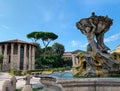 Piazza Bocca della VeritÃÂ  with the ancient Temple of Hercules Victor and the Fountain of the Tritons, Rome Royalty Free Stock Photo